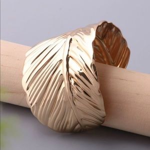 Beautiful gold bohemian feather bracelet cuff